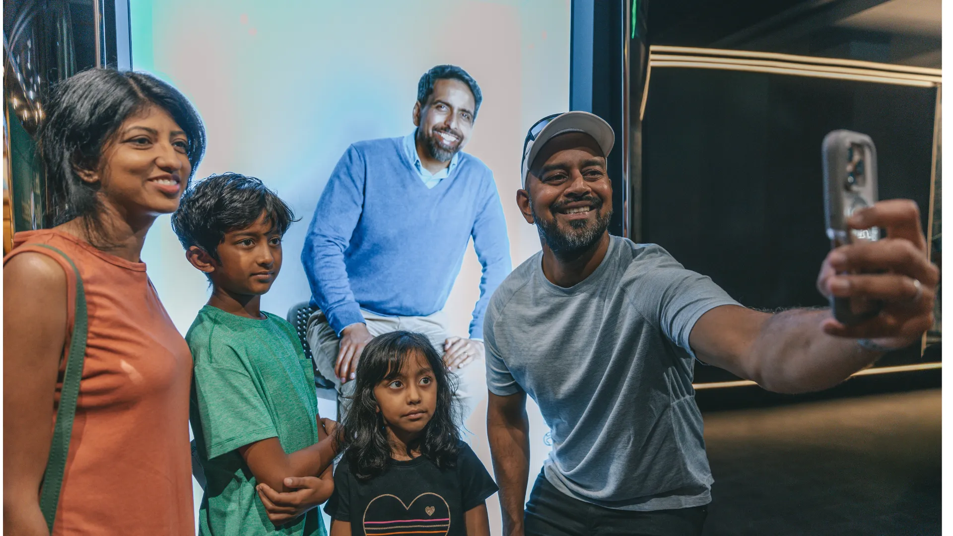 A photograph of visitors with an Ambassador. 