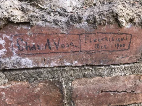 Images of bricks signed by electrician
