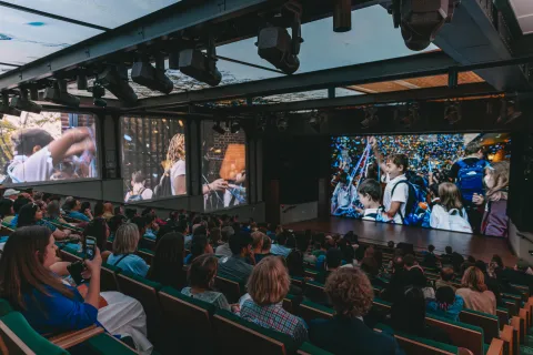  photograph of patrons in the Stand Together theater.